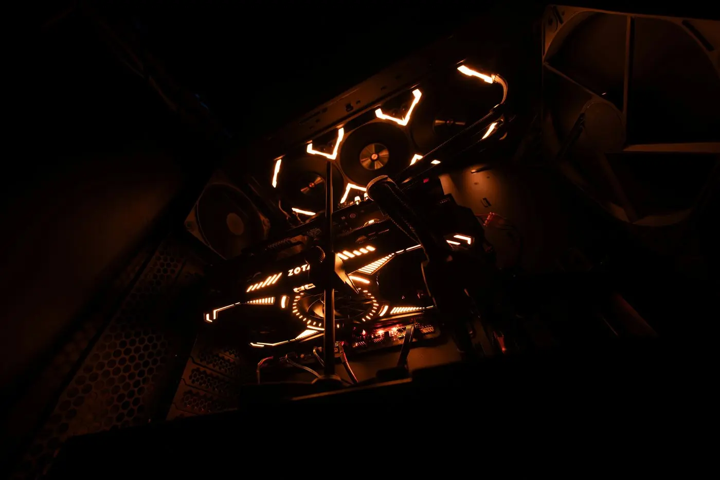 Inside a gaming PC with orange lighting